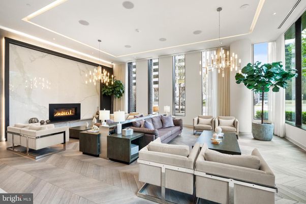 Fireplace, Interior, Living room, Marble Walls, Pendant Lights, Recessed Lighting, Wood Texture Flooring