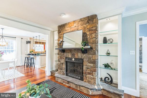 Dining room, Fireplace, Interior, Pendant Lights, Recessed Lighting, Stone Walls, Wood Texture Flooring