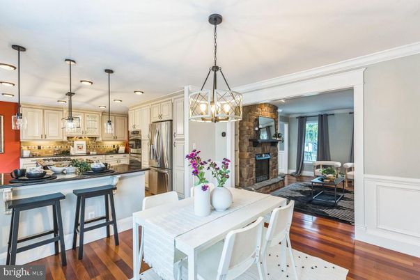 Dining room, Fireplace, Interior, Kitchen, Pendant Lights, Recessed Lighting, Stainless Steel Appliances, Wood Texture Flooring