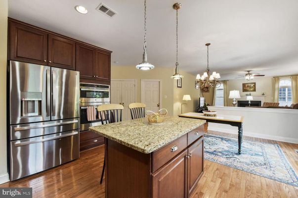 Chandelier, Interior, Kitchen, Pendant Lights, Recessed Lighting, Stainless Steel Appliances, Wood Texture Flooring