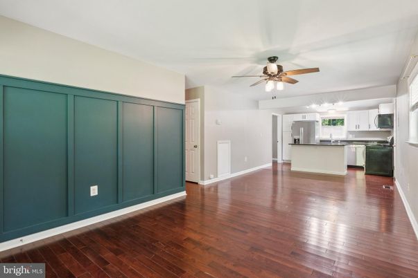 Empty room, Interior, Kitchen, Stainless Steel Appliances, Wood Texture Flooring