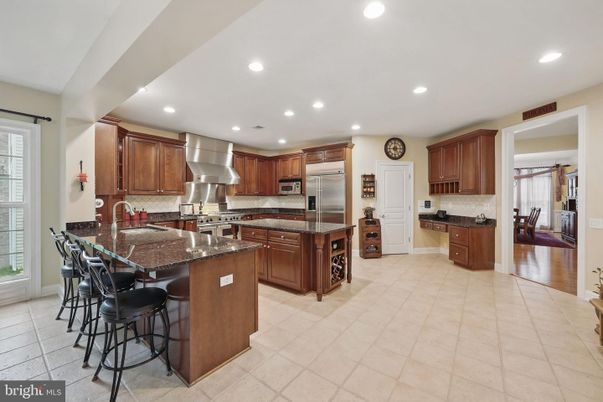 Dining room, Interior, Kitchen, Recessed Lighting, Stainless Steel Appliances, Wood Texture Flooring