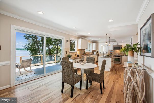 Dining room, Interior, Kitchen, Pendant Lights, Recessed Lighting, Stainless Steel Appliances, Wood Texture Flooring