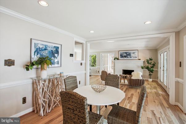 Dining room, Fireplace, Interior, Living room, Recessed Lighting, Wood Texture Flooring