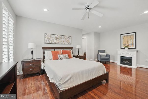 Bedroom, Fireplace, Interior, Recessed Lighting, Wood Texture Flooring