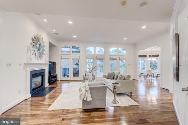 Dining room, Fireplace, Interior, Living room, Pendant Lights, Recessed Lighting, Wood Texture Flooring