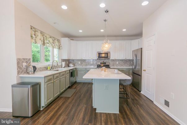 Chandelier, Interior, Kitchen, Pendant Lights, Recessed Lighting, Stainless Steel Appliances, Wood Texture Flooring