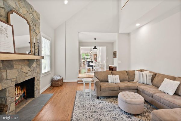 Dining room, Fireplace, Interior, Living room, Pendant Lights, Recessed Lighting, Wood Texture Flooring