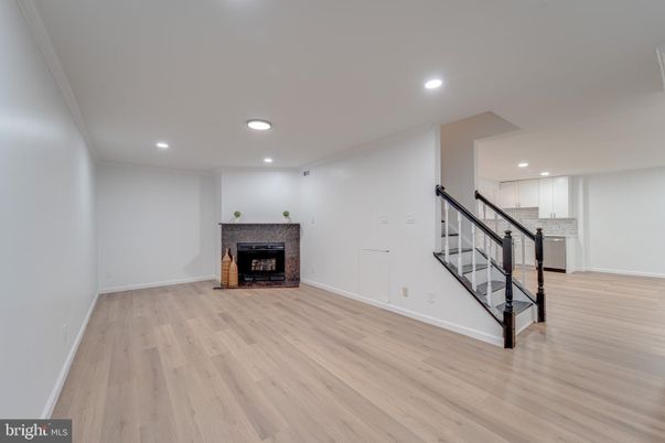 Empty room, Fireplace, Interior, Recessed Lighting, Wood Texture Flooring