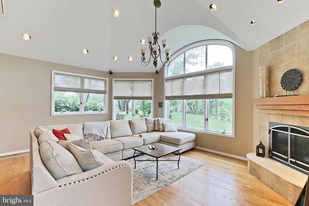 Chandelier, Fireplace, Interior, Living room, Recessed Lighting, Wood Texture Flooring