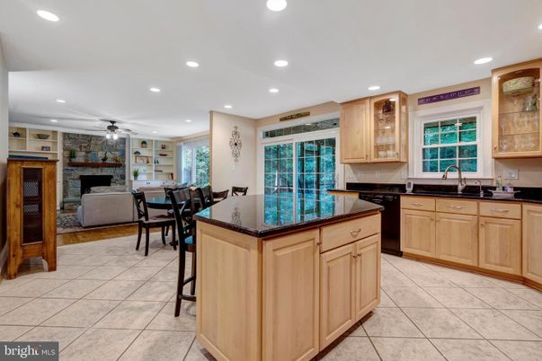 Dining room, Fireplace, Interior, Kitchen, Living room, Recessed Lighting, Wood Texture Flooring