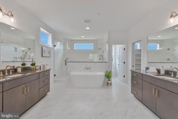 Bathroom, Dual Sink Vanities, Free Standing Baths, Interior, Marble, Marble Walls, Recessed Lighting
