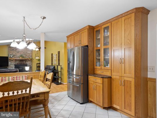 Chandelier, Dining room, Fireplace, Interior, Kitchen, Stone Walls, Wood Texture Flooring