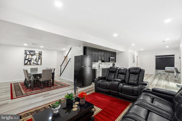 Home Theatre Room, Dining room, Interior, Kitchen, Living room, Recessed Lighting, Stainless Steel Appliances, Wood Texture Flooring