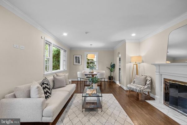 Dining room, Fireplace, Interior, Living room, Pendant Lights, Recessed Lighting, Wood Texture Flooring