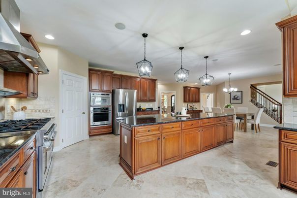 Chandelier, Dining room, Interior, Kitchen, Pendant Lights, Recessed Lighting, Stainless Steel Appliances