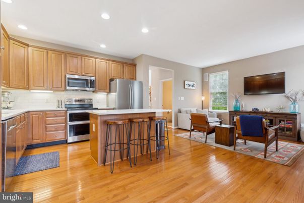 Dining room, Interior, Kitchen, Living room, Recessed Lighting, Stainless Steel Appliances, Wood Texture Flooring