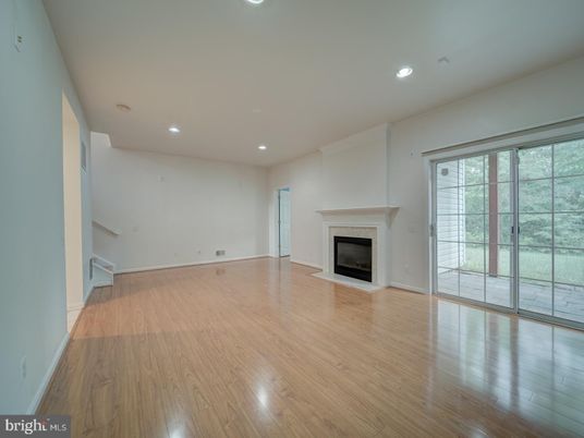 Empty room, Fireplace, Interior, Recessed Lighting, Wood Texture Flooring