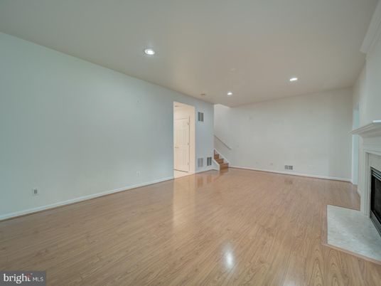 Empty room, Fireplace, Interior, Recessed Lighting, Wood Texture Flooring