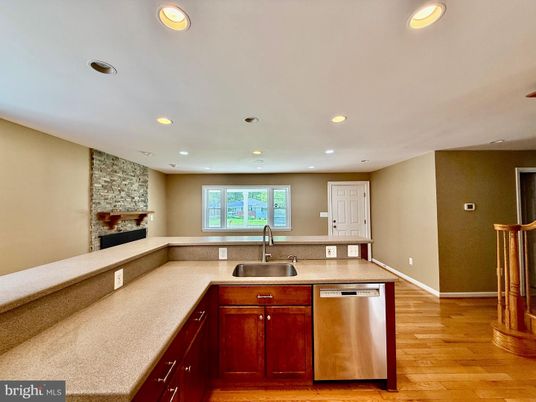Fireplace, Interior, Kitchen, Recessed Lighting, Stone Walls, Wood Texture Flooring