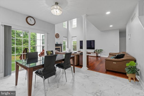 Chandelier, Dining room, Fireplace, Interior, Marble, Recessed Lighting, Wood Texture Flooring