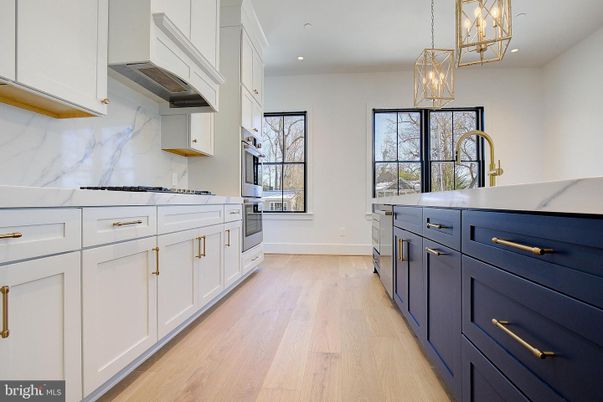 Interior, Kitchen, Marble Walls, Pendant Lights, Recessed Lighting, Wood Texture Flooring