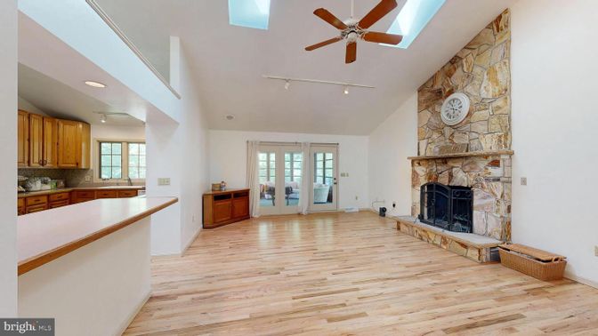 Fireplace, Interior, Recessed Lighting, Stone Walls, Wood Texture Flooring