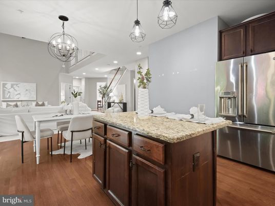 Chandelier, Dining room, Interior, Kitchen, Pendant Lights, Recessed Lighting, Stainless Steel Appliances, Wood Texture Flooring