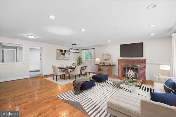 Dining room, Fireplace, Interior, Living room, Pendant Lights, Recessed Lighting, Wood Texture Flooring