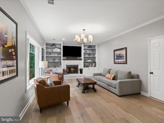 Chandelier, Fireplace, Interior, Living room, Recessed Lighting, Wood Texture Flooring