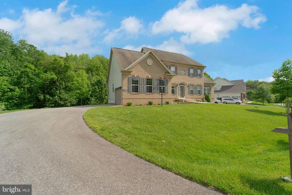 Attached, Backyard, Exterior, Facade, Brick Facade, French Provincial