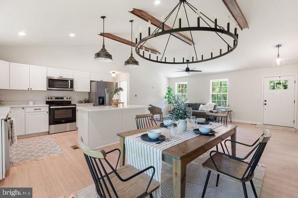 Dining room, Interior, Kitchen, Living room, Pendant Lights, Recessed Lighting, Stainless Steel Appliances, Wooden Beams, Wood Texture Flooring