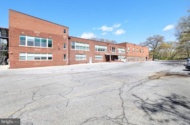 Exterior, Facade, Brick Facade, Condo Building