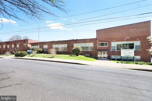 Exterior, Facade, Brick Facade, Condo Building