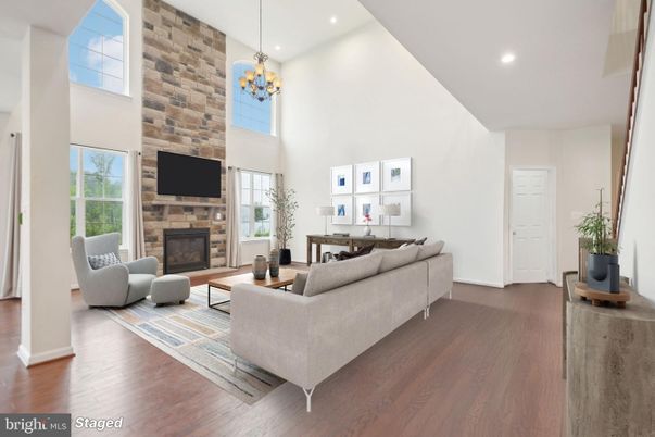 Fireplace, Interior, Living room, Pendant Lights, Recessed Lighting, Stone Walls, Wood Texture Flooring