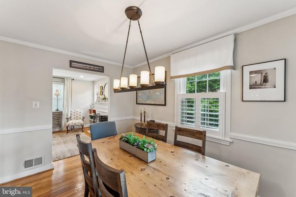 Dining room, Fireplace, Interior, Living room, Pendant Lights, Recessed Lighting, Wood Texture Flooring