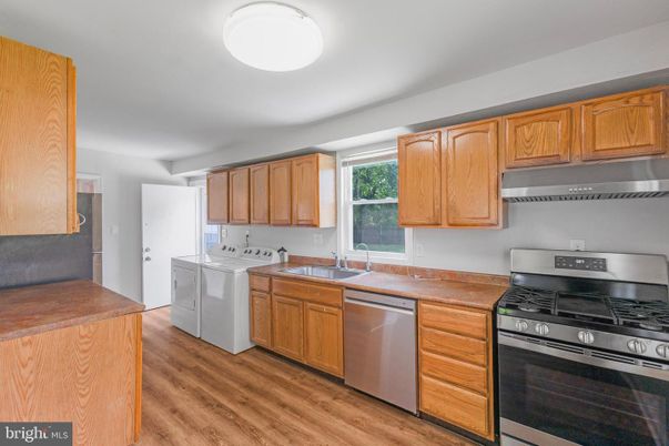 Interior, Kitchen, Stainless Steel Appliances, Washer, Wood Texture Flooring