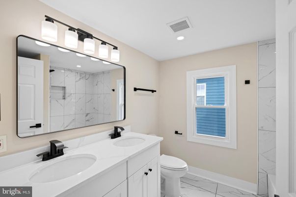 Bathroom, Dual Sink Vanities, Interior, Marble, Marble Walls, Recessed Lighting
