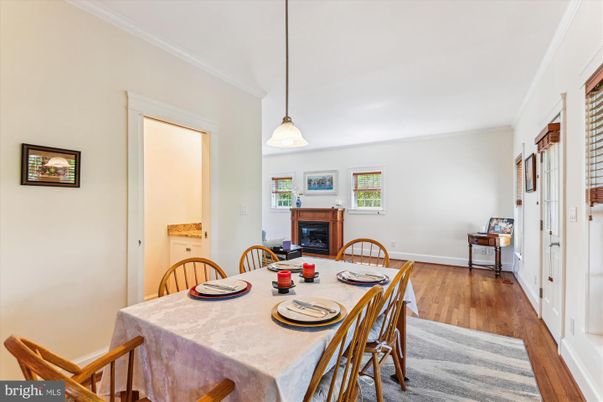 Dining room, Fireplace, Interior, Pendant Lights, Wood Texture Flooring
