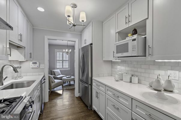 Chandelier, Interior, Kitchen, Recessed Lighting, Stainless Steel Appliances, Wood Texture Flooring