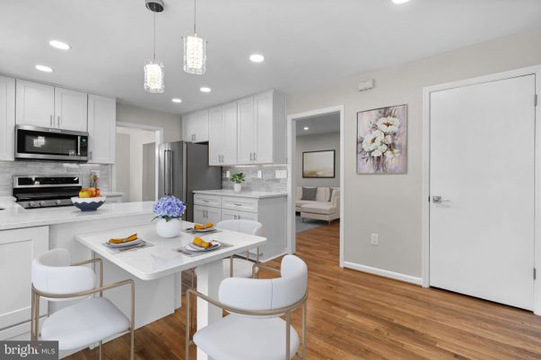 Dining room, Interior, Kitchen, Pendant Lights, Recessed Lighting, Stainless Steel Appliances, Wood Texture Flooring
