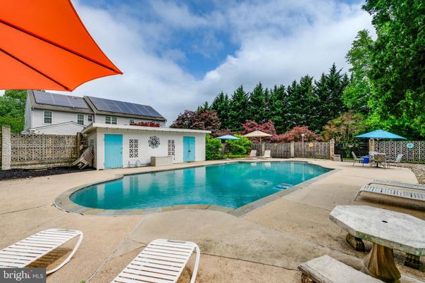 Exterior, Pool, Solar Panels