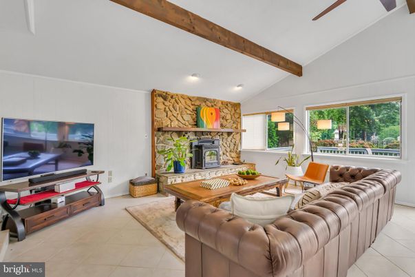 Fireplace, Interior, Living room, Recessed Lighting, Stone Walls, Wooden Beams
