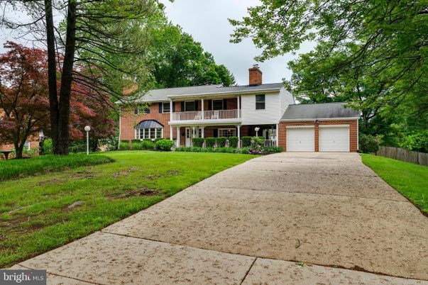 Attached, Backyard, Exterior, Facade, Brick Facade, Split Level
