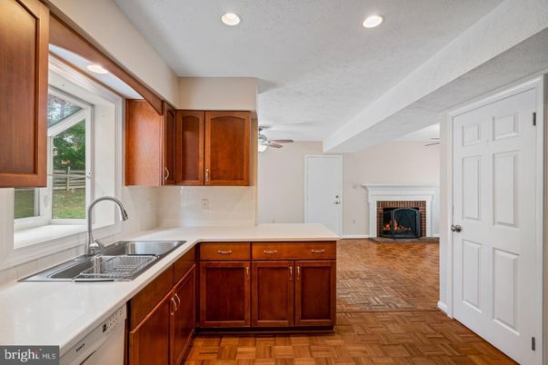 Fireplace, Interior, Kitchen, Recessed Lighting, Wood Texture Flooring