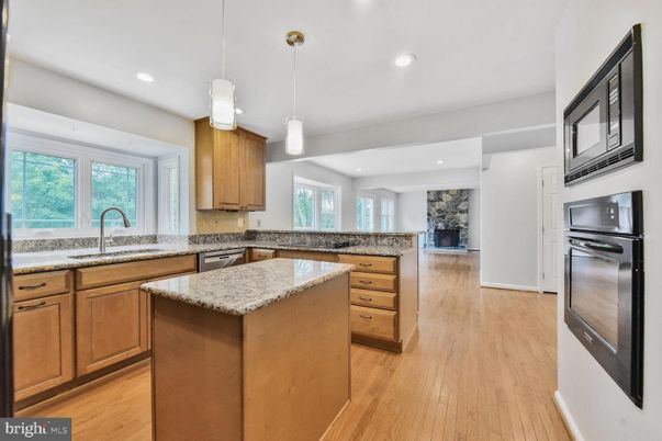 Fireplace, Interior, Kitchen, Pendant Lights, Recessed Lighting, Stainless Steel Appliances, Wood Texture Flooring