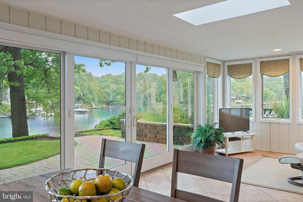 Dining room, Interior, Recessed Lighting, Sun Room, Water, Wood Texture Flooring