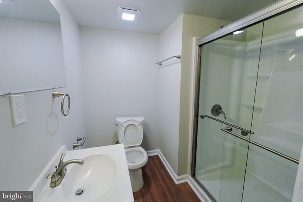 Bathroom, Glass Shower, Interior, Recessed Lighting, Wood Texture Flooring