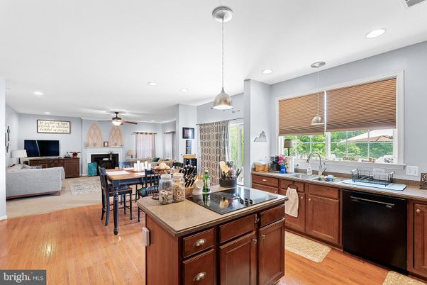Dining room, Fireplace, Interior, Kitchen, Living room, Pendant Lights, Recessed Lighting, Wood Texture Flooring