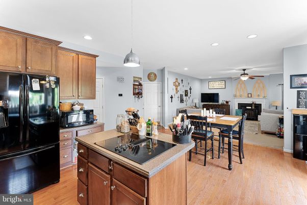 Dining room, Fireplace, Interior, Kitchen, Living room, Pendant Lights, Recessed Lighting, Wood Texture Flooring